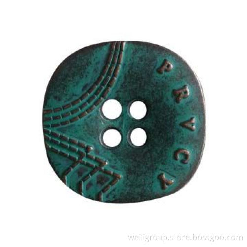 Metal button with distressed